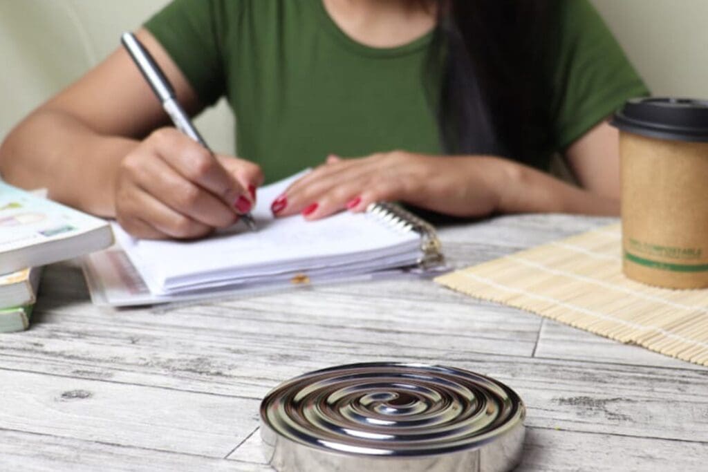 Woman writing in a notebook